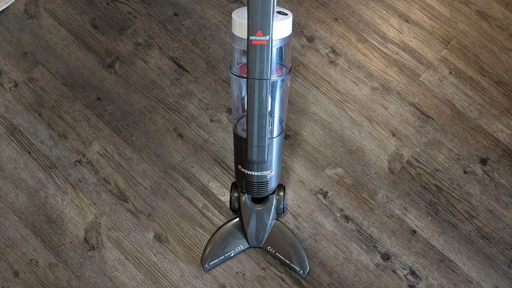 Bissell PowerEdge stick vacuum on hard floor.