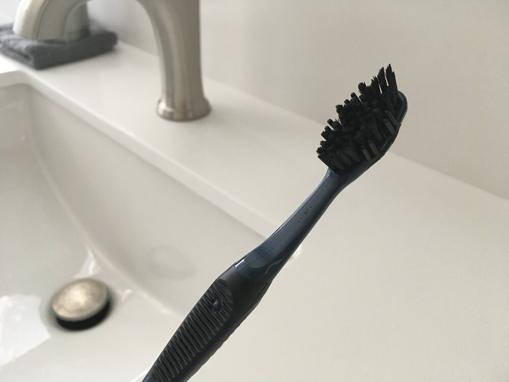 Oral- B charcoal toothbrush close up