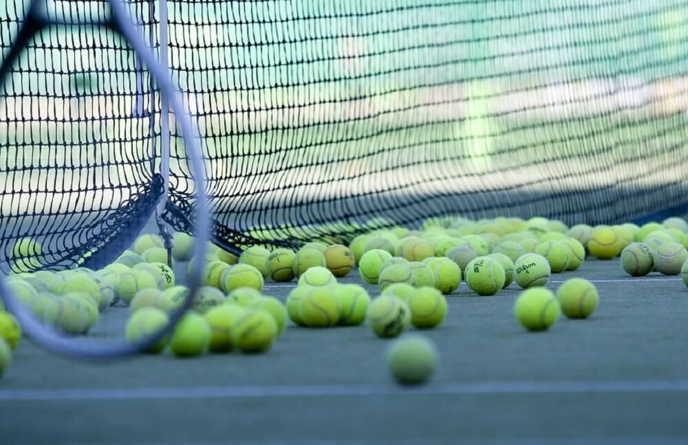 Tennis balls on court